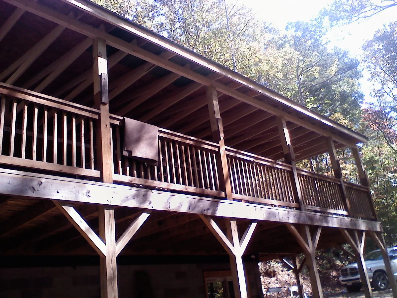 Timber framing under a new elevated porch and deck — Roof Leak Repair in Queens Village by Roofing Brothers